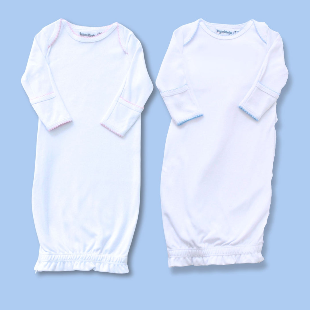 Two white converter gowns, one with pink picot trim, one with blue picot trim