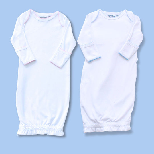 Two white converter gowns, one with pink picot trim, one with blue picot trim